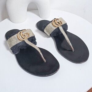 Gucci Women's Black and Metallic Gold Sandals